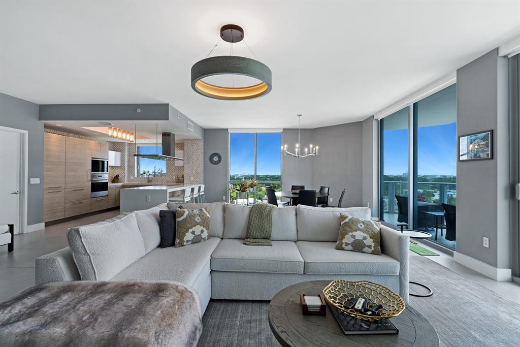 17111 Biscayne Boulevard, Unit 1101 North Miami Beach, FL 33160 - Photo 10 of 43 a living room with furniture and a large window