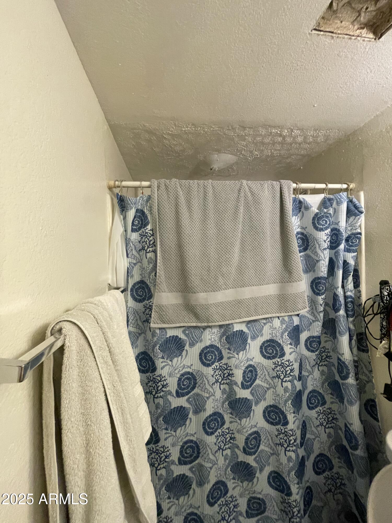 2813 East Monte Cristo Avenue Phoenix, AZ 85032 - Photo 13 of 26 a view of walk in closet with clothes and shoes