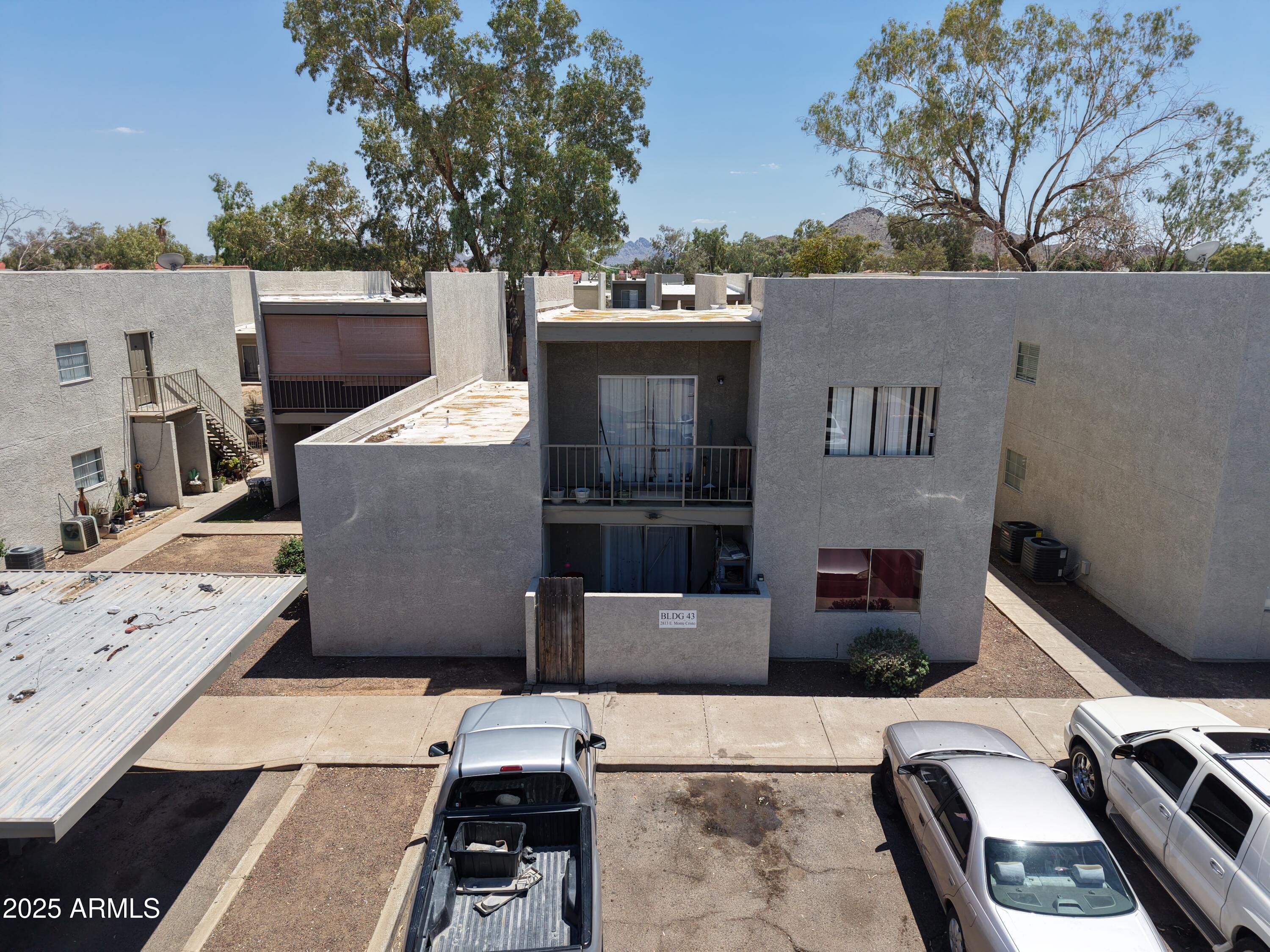 2813 East Monte Cristo Avenue Phoenix, AZ 85032 - Photo 2 of 26 a view of a back yard of the house