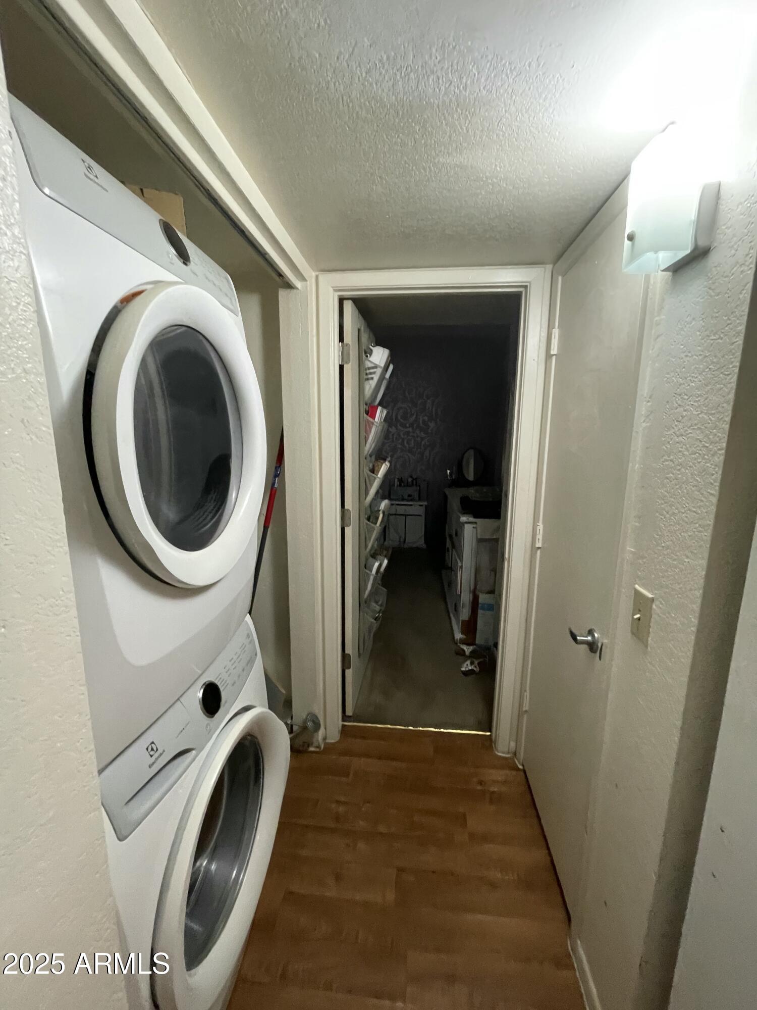 2813 East Monte Cristo Avenue Phoenix, AZ 85032 - Photo 22 of 26 a view of a hallway with washer and dryer