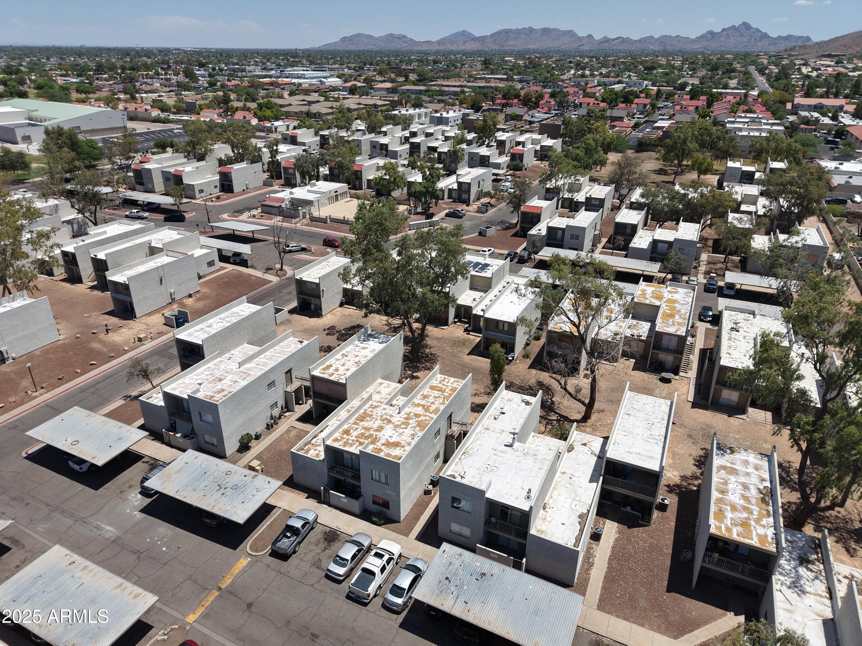 2813 East Monte Cristo Avenue Phoenix, AZ 85032 - Photo 6 of 26 an aerial view of a city with lots of residential buildings