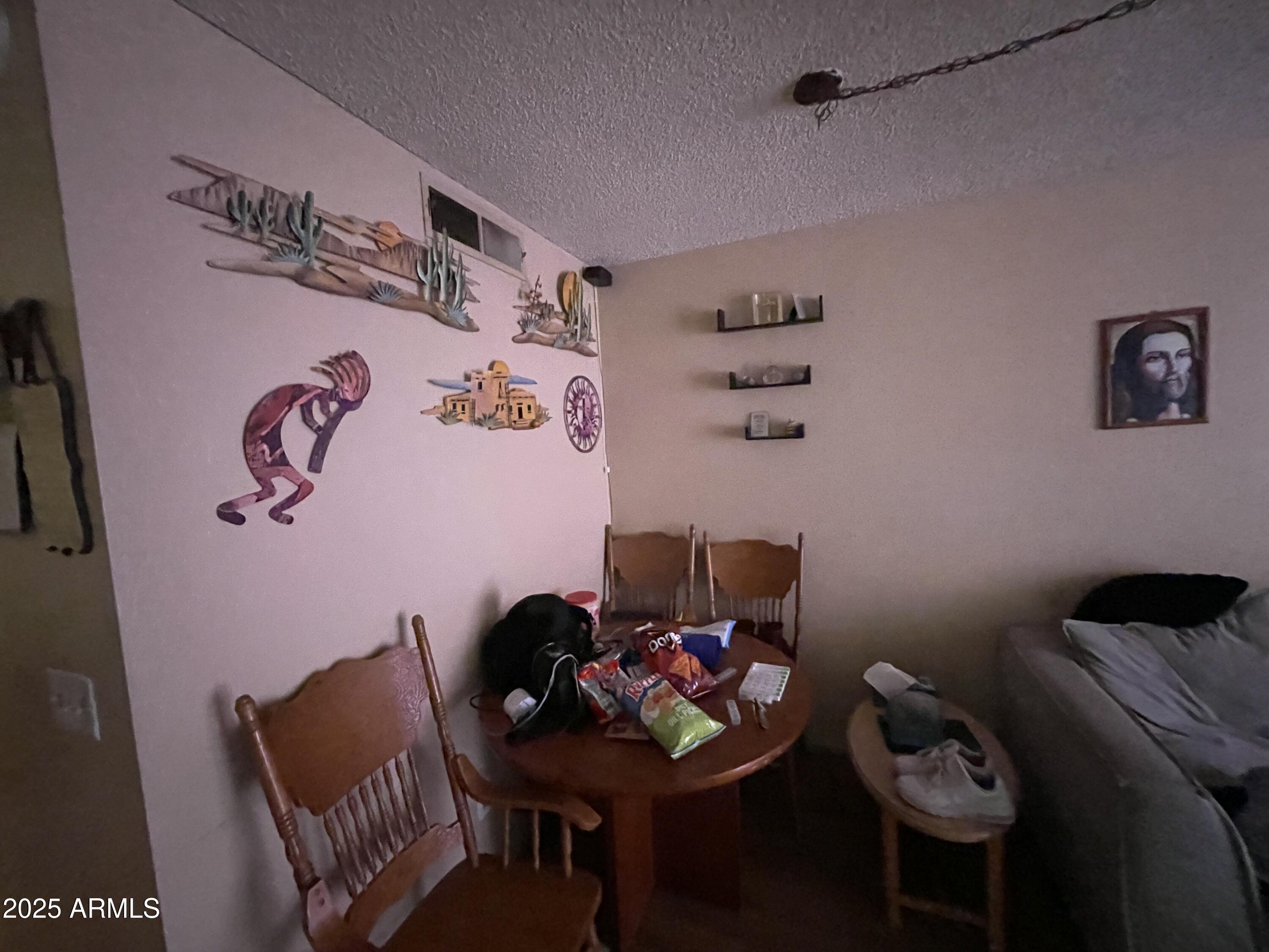 2813 East Monte Cristo Avenue Phoenix, AZ 85032 - Photo 9 of 26 a view of a workspace with furniture