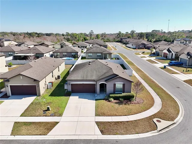 a view of a house with a swimming pool