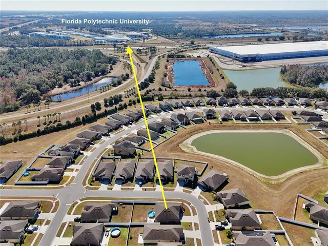 an aerial view of a building with garden space and outdoor space