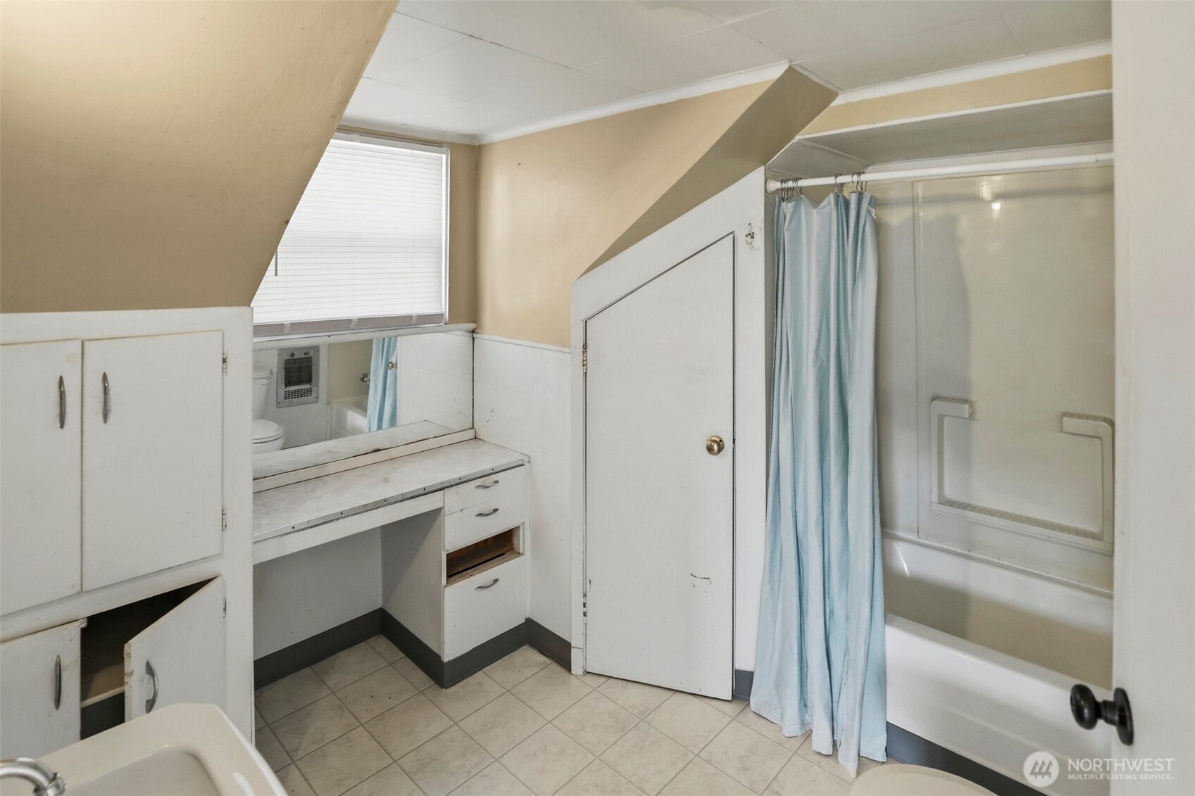 1817 34th Street Everett, WA 98201 - Photo 12 of 19 a bathroom with a shower and a sink