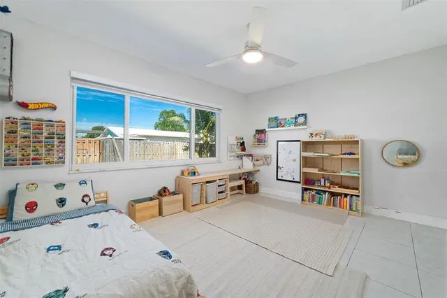 a bedroom with a bed and a cabinets