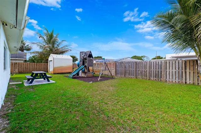 a view of a backyard with a garden