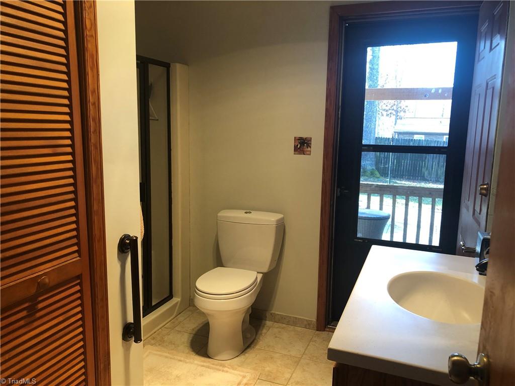 210 North County Home Road Lexington, NC 27292 - Photo 18 of 29 Master bathroom/suite opens to rear covered deck overlooking backyard
