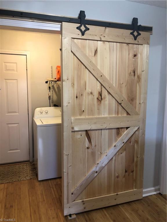 210 North County Home Road Lexington, NC 27292 - Photo 23 of 29 Barn door in Laundry room off of 3rd bedroom (currently being used as a den)