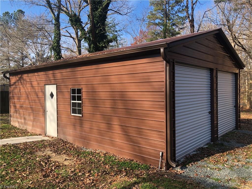 210 North County Home Road Lexington, NC 27292 - Photo 5 of 29 Spacious detached garage. Small bay in the rear for lawn equipment