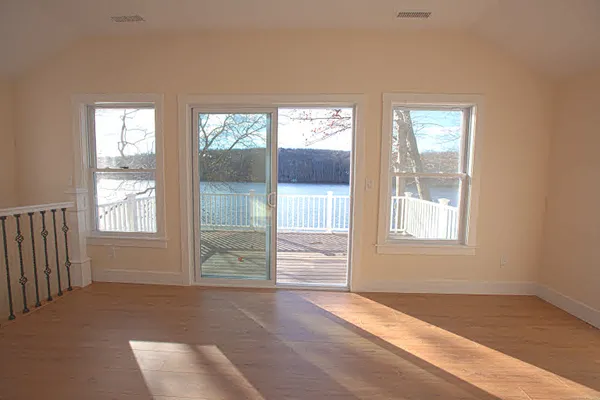 an empty room with windows