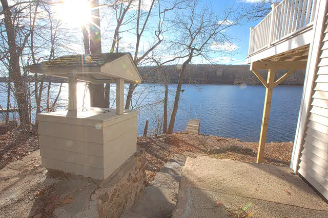 a view of a house with a snow in the yard