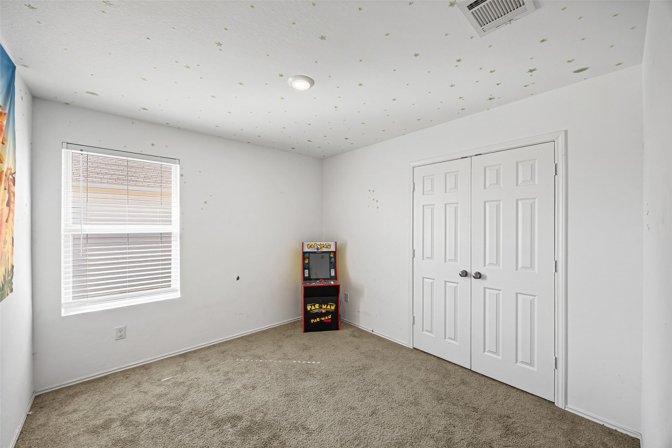 5976 Rimini Landing Lane Porter, TX 77365 - Photo 16 of 18 an empty room with a window