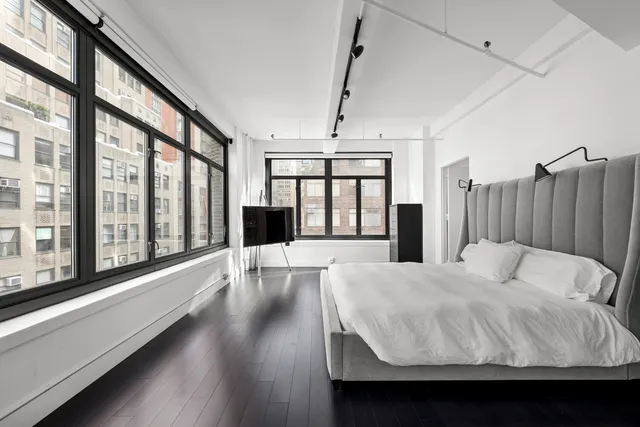 a bathroom with a bathtub and sink