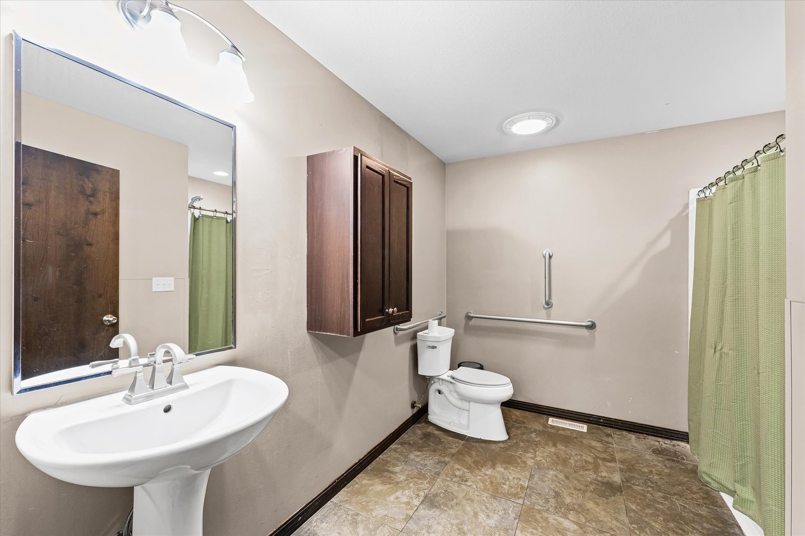 601 Curtis Road Ogden, IL 61859 - Photo 16 of 29 a bathroom with a sink toilet and shower