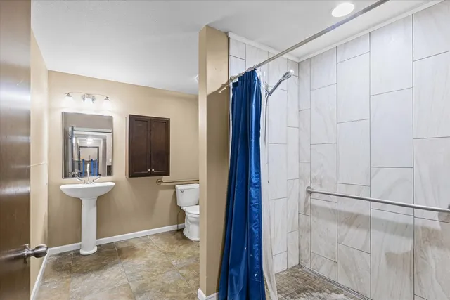 a bathroom with a sink and a toilet
