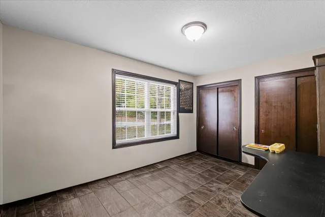 a view of livingroom with furniture and windows