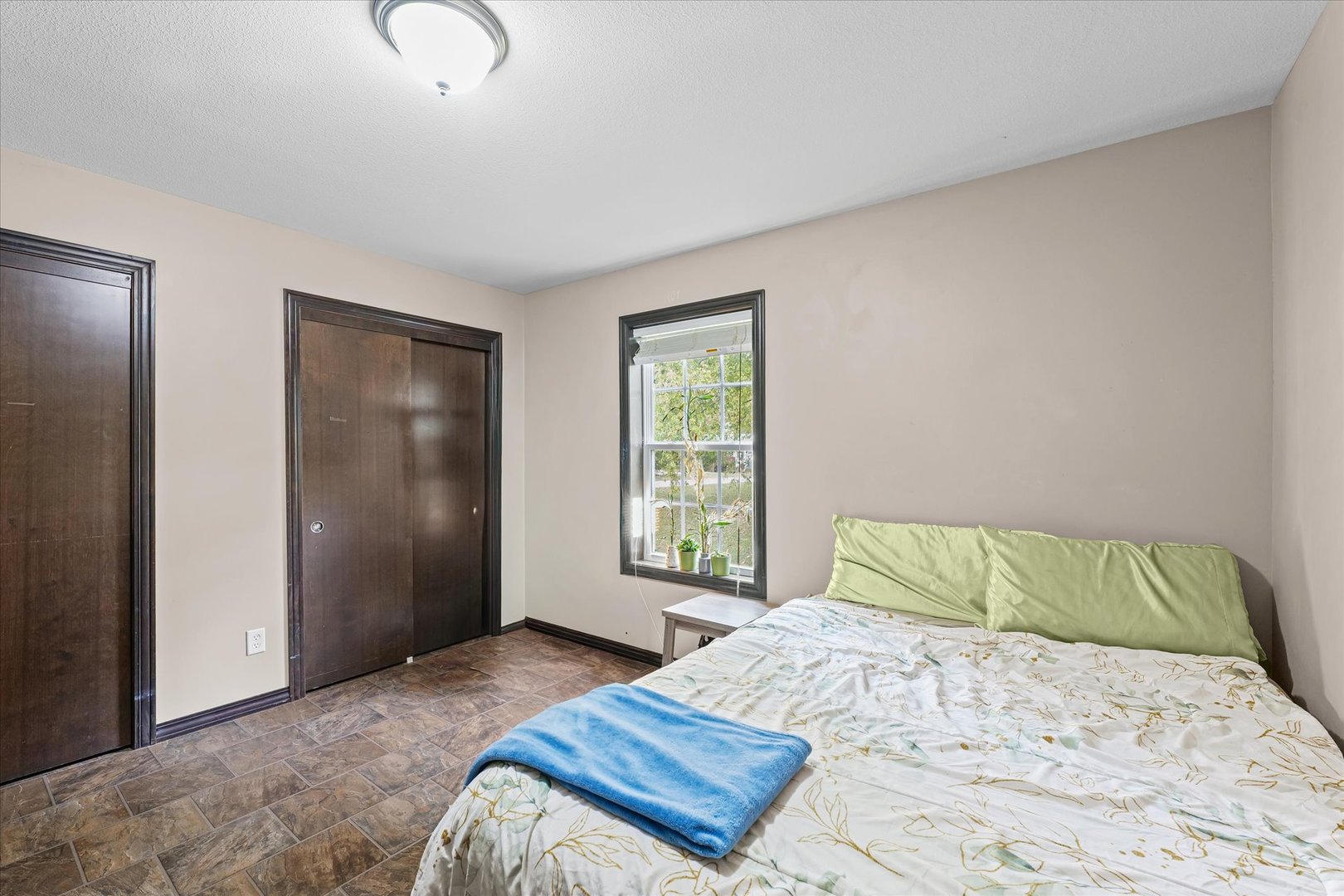 601 Curtis Road Ogden, IL 61859 - Photo 25 of 29 a bedroom with a bed and a window