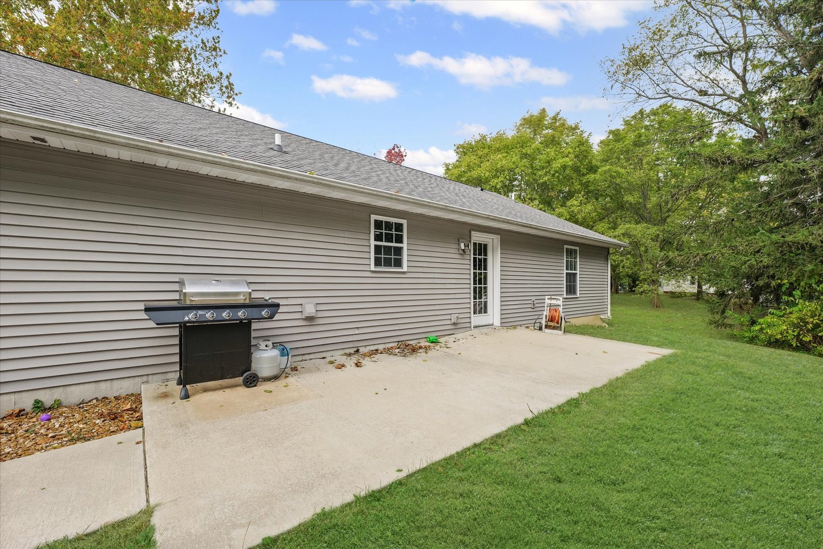 601 Curtis Road Ogden, IL 61859 - Photo 28 of 29 a view of a house with a backyard
