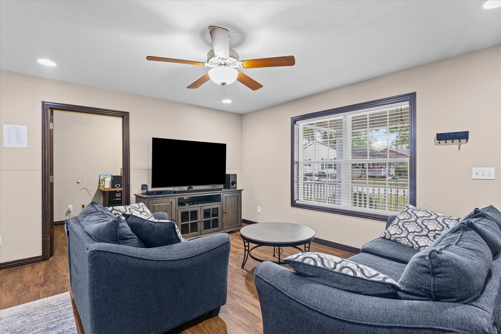 601 Curtis Road Ogden, IL 61859 - Photo 5 of 29 a living room with furniture and a flat screen tv