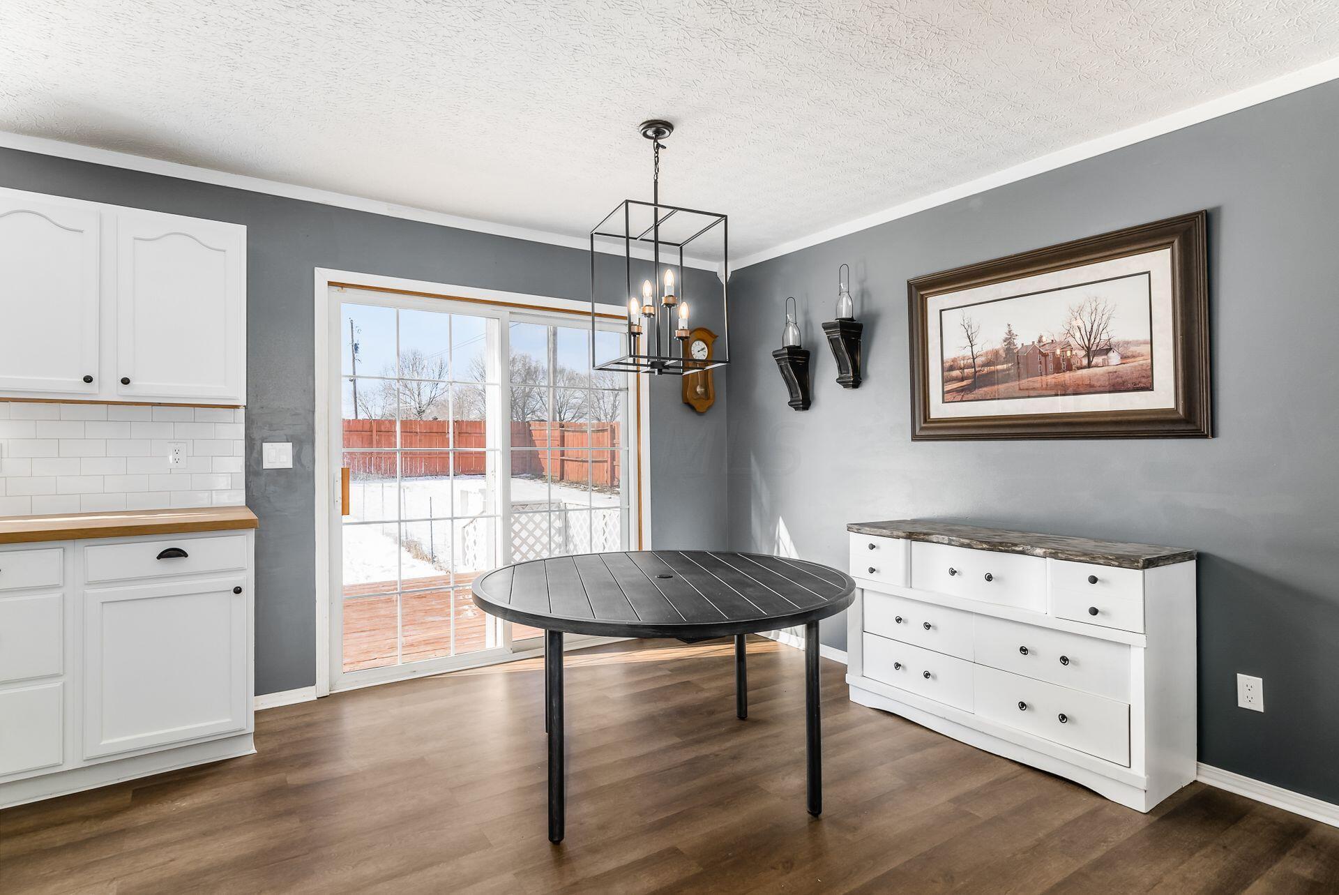 5040 Cook Road South Bloomfield, OH 43103 - Photo 15 of 42 Dining Room overlooking deck