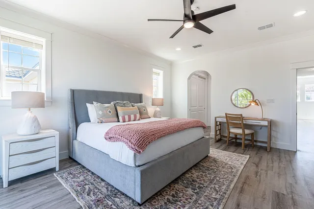 a terrace with outdoor seating and city view