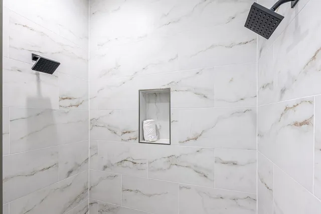 a swimming pool with outdoor seating and yard