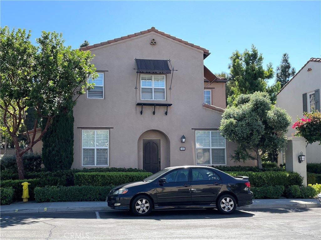 a car parked in front of a house