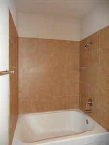 5321 Locust Drive McKinney, TX 75070 - Photo 17 of 17 a bathroom with a bathtub