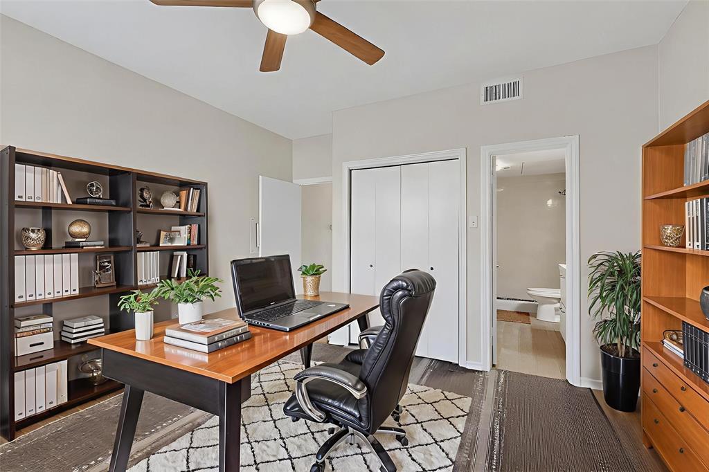 14277 Preston Road, Unit 923 Dallas, TX 75254 - Photo 22 of 39 a view of a workspace with furniture and a potted plant