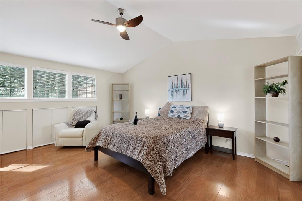 14277 Preston Road, Unit 923 Dallas, TX 75254 - Photo 27 of 39 a bedroom with a bed and furniture