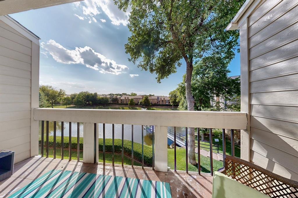 14277 Preston Road, Unit 923 Dallas, TX 75254 - Photo 36 of 39 a view of a balcony with wooden floor and outdoor space