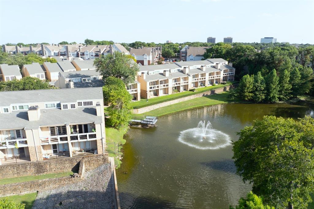 14277 Preston Road, Unit 923 Dallas, TX 75254 - Photo 8 of 39 a view of a lake with building