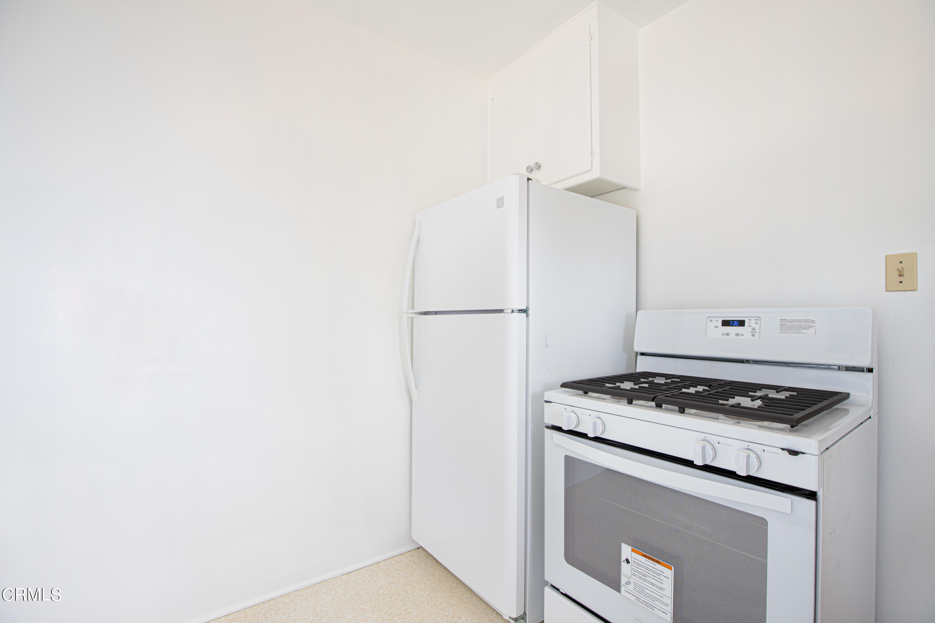 1564 Riverside Drive Glendale, CA 91201 - Photo 11 of 22 a white kitchen with granite countertop stainless steel appliances