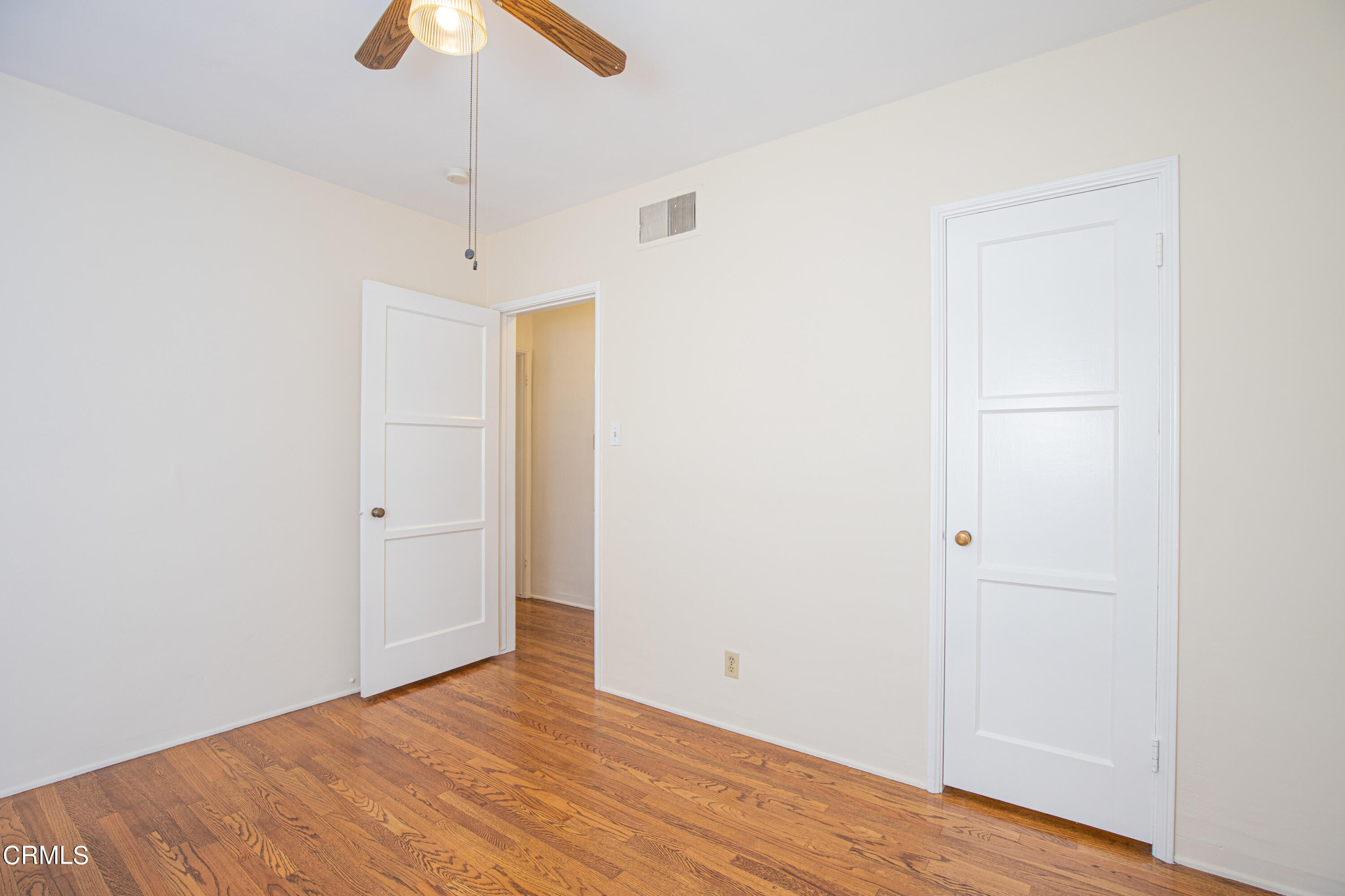 1564 Riverside Drive Glendale, CA 91201 - Photo 16 of 22 a view of an empty room with wooden floor