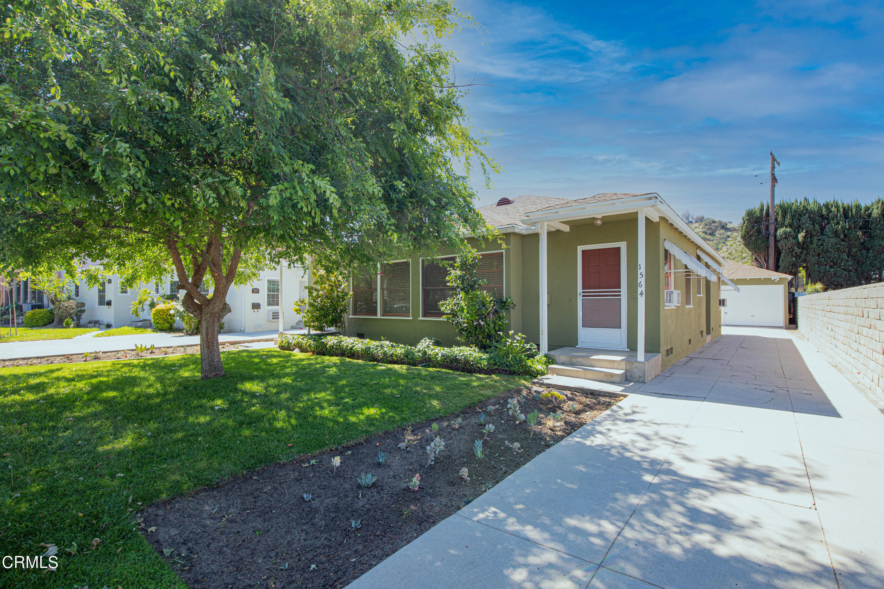 1564 Riverside Drive Glendale, CA 91201 - Photo 22 of 22 a front view of a house with garden