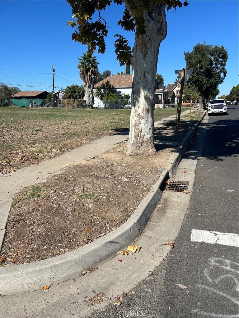 1563 P Newman, CA 95360 - Photo 6 of 8 a view of a yard and cars park
