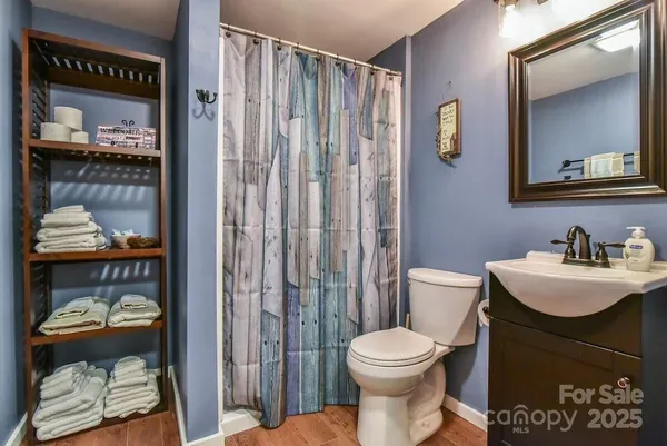 a spacious bedroom with two beds and windows