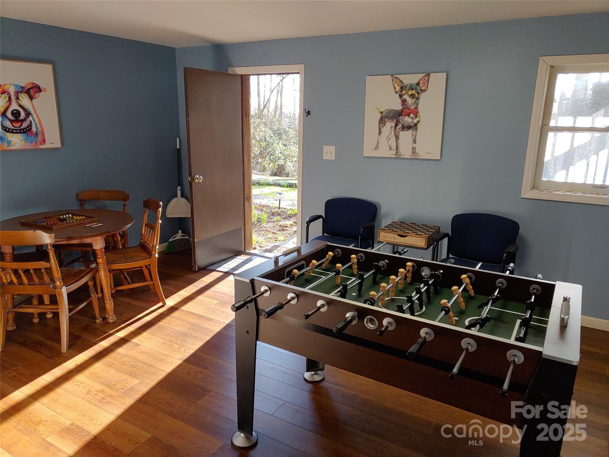 48 Buck Ridge Road Fairview, NC 28730 - Photo 24 of 38 a bedroom with furniture and a window