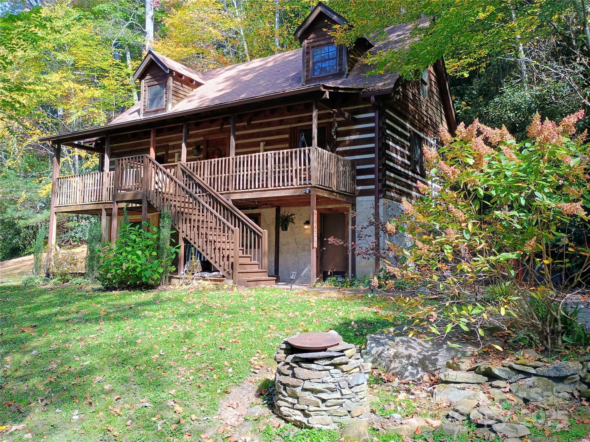 48 Buck Ridge Road Fairview, NC 28730 - Photo 33 of 38 a view of a house with backyard