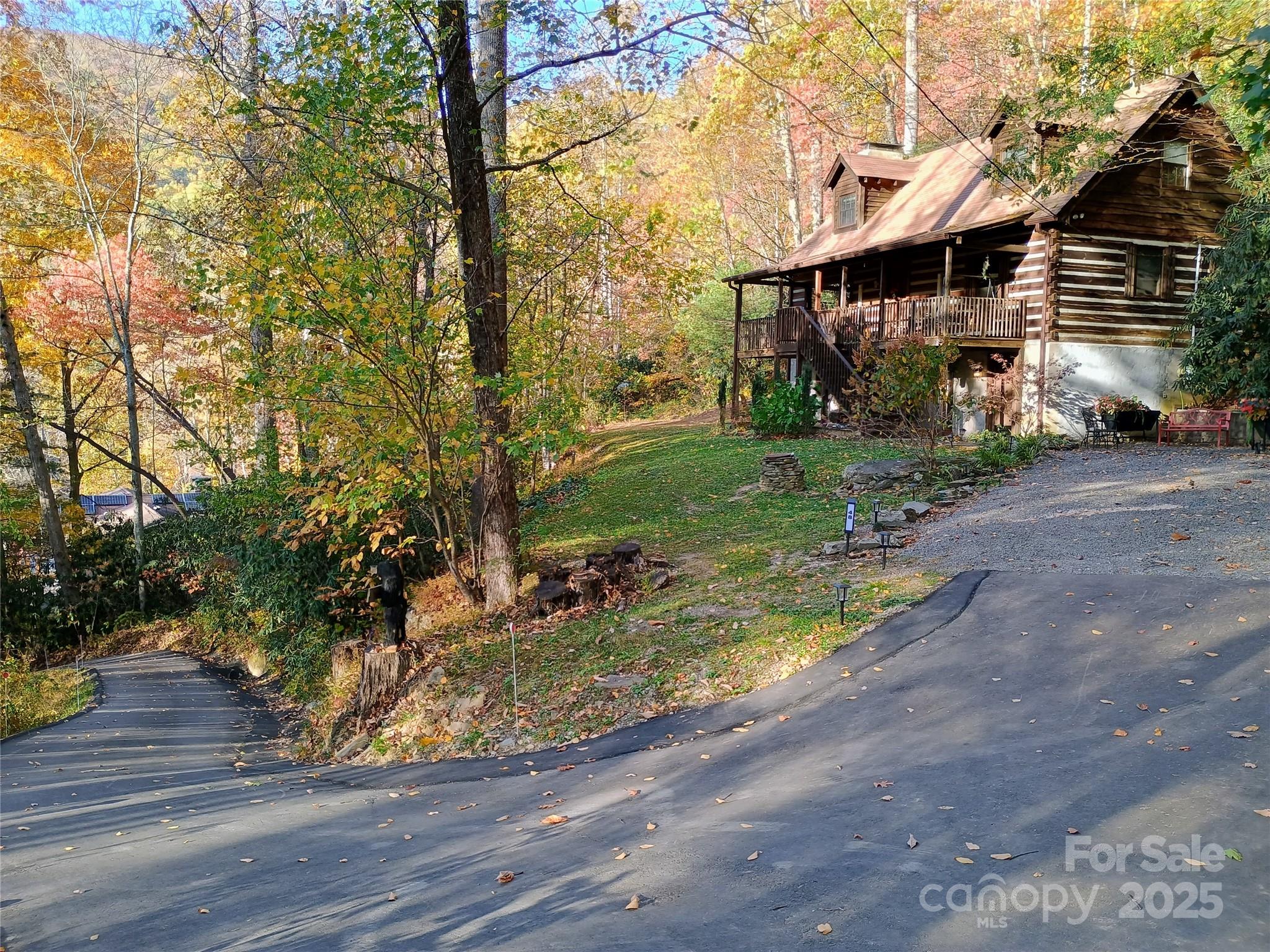 48 Buck Ridge Road Fairview, NC 28730 - Photo 36 of 38 a view of a yard in front of house