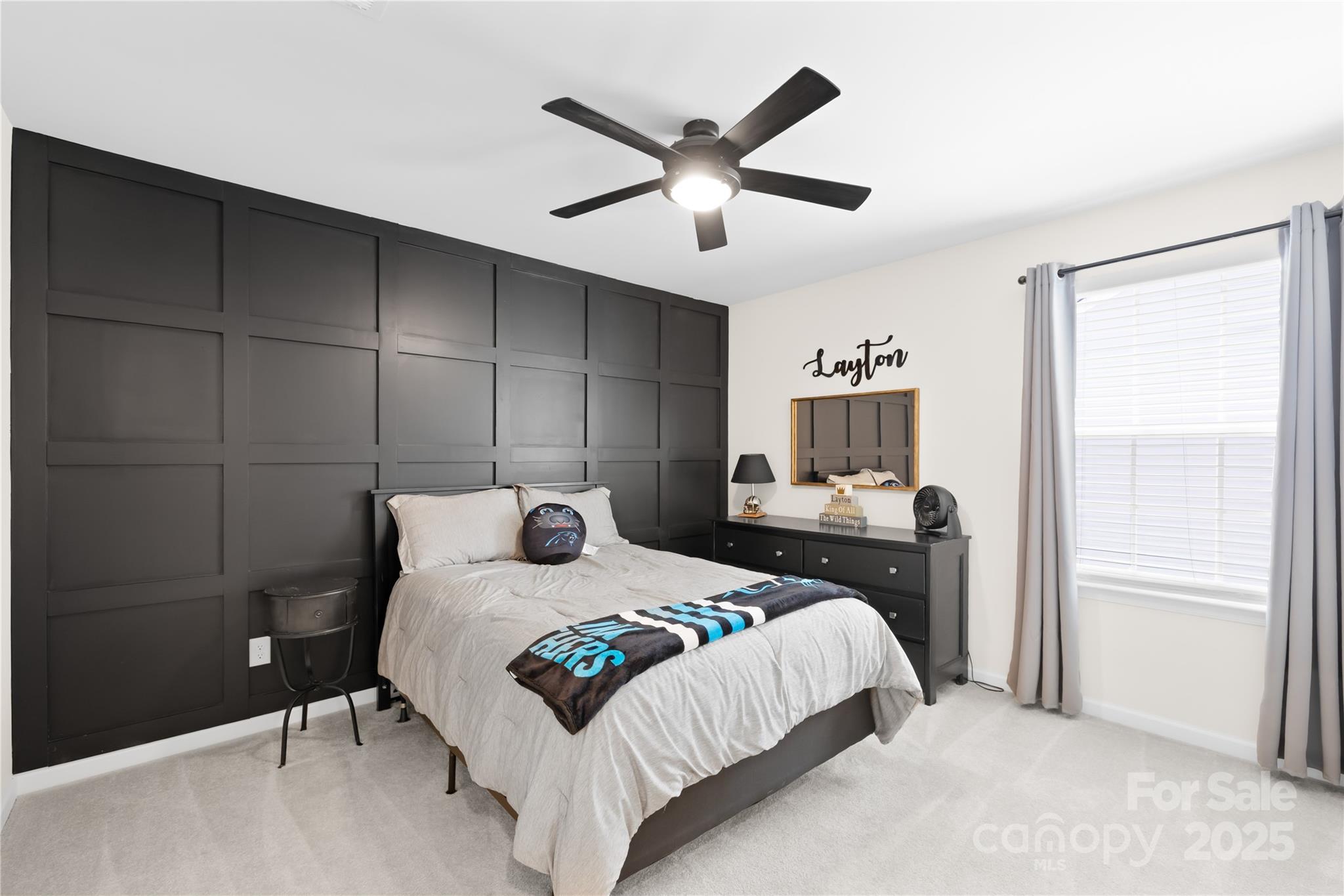 3110 Streamside Drive Davidson, NC 28036 - Photo 25 of 39 a bedroom with a bed and a table