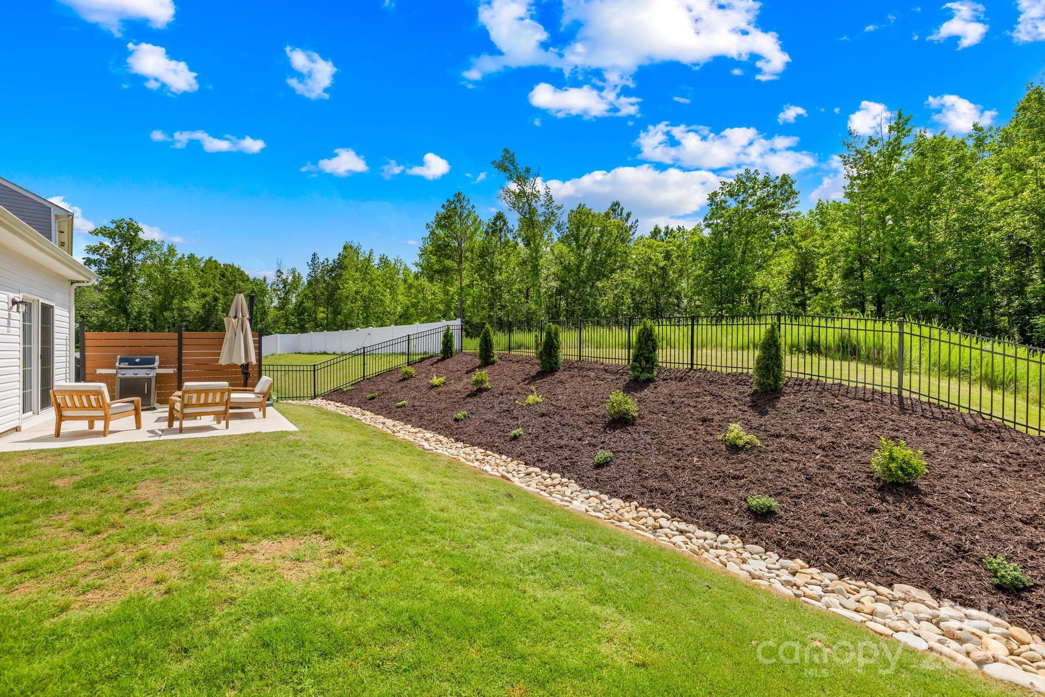 3110 Streamside Drive Davidson, NC 28036 - Photo 28 of 39 a view of yard with tree s