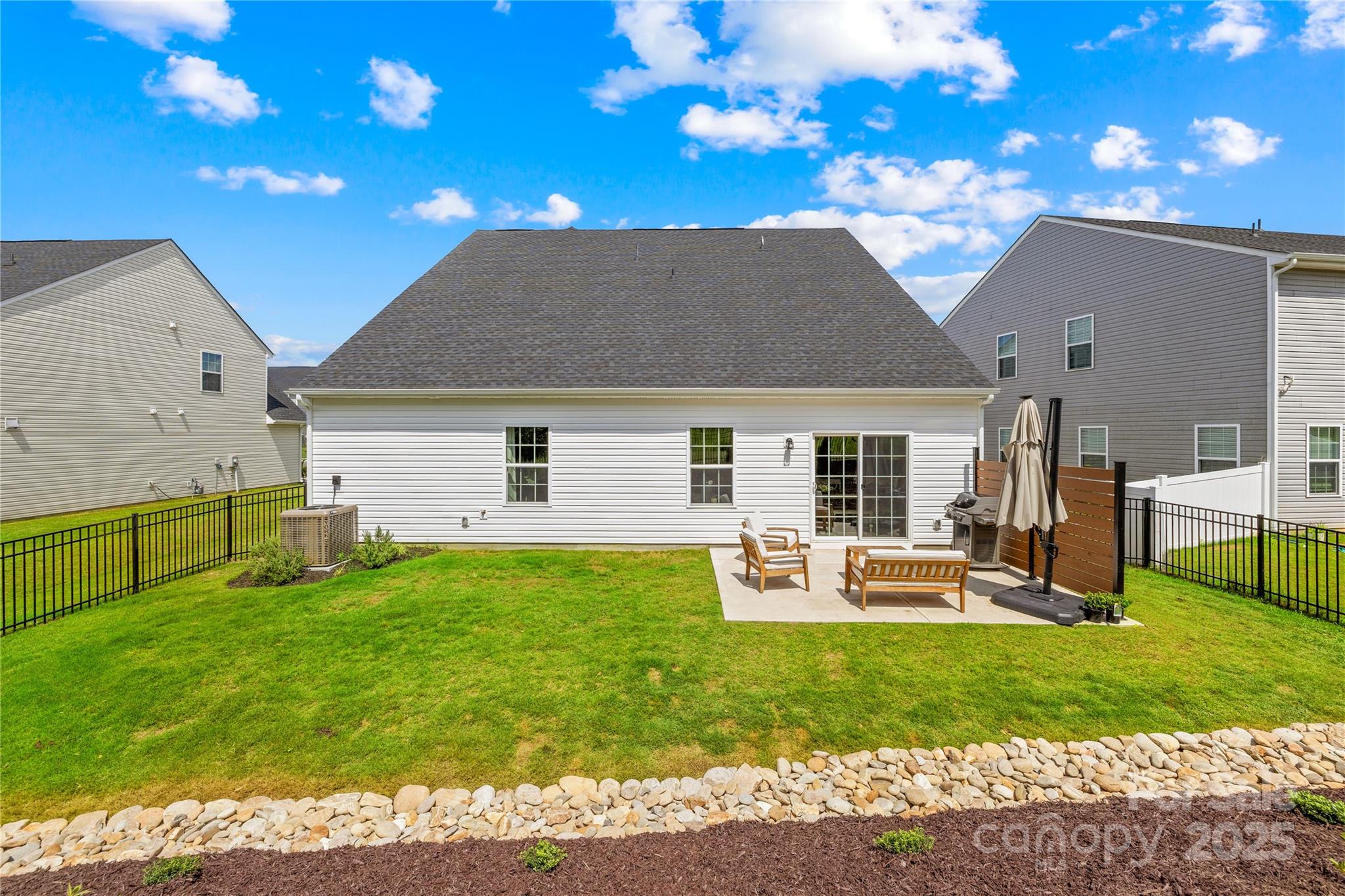 3110 Streamside Drive Davidson, NC 28036 - Photo 29 of 39 a front view of house with yard and outdoor seating