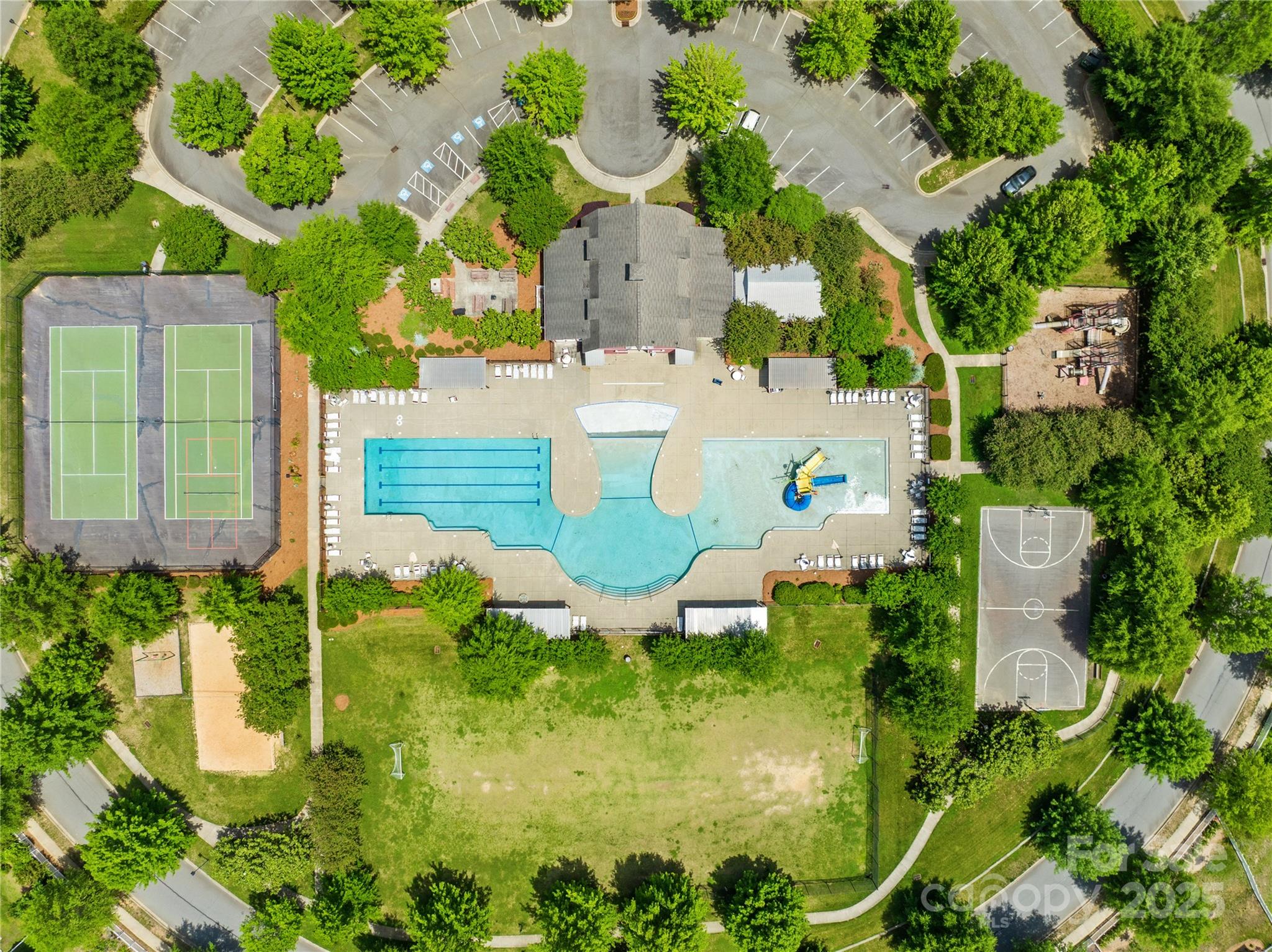 3110 Streamside Drive Davidson, NC 28036 - Photo 37 of 39 a view of swimming pool with a table and chairs