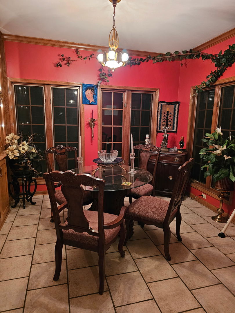 22775 Sherman Road Steger, IL 60475 - Photo 13 of 23 a view of a dinning tables and chairs in a patio