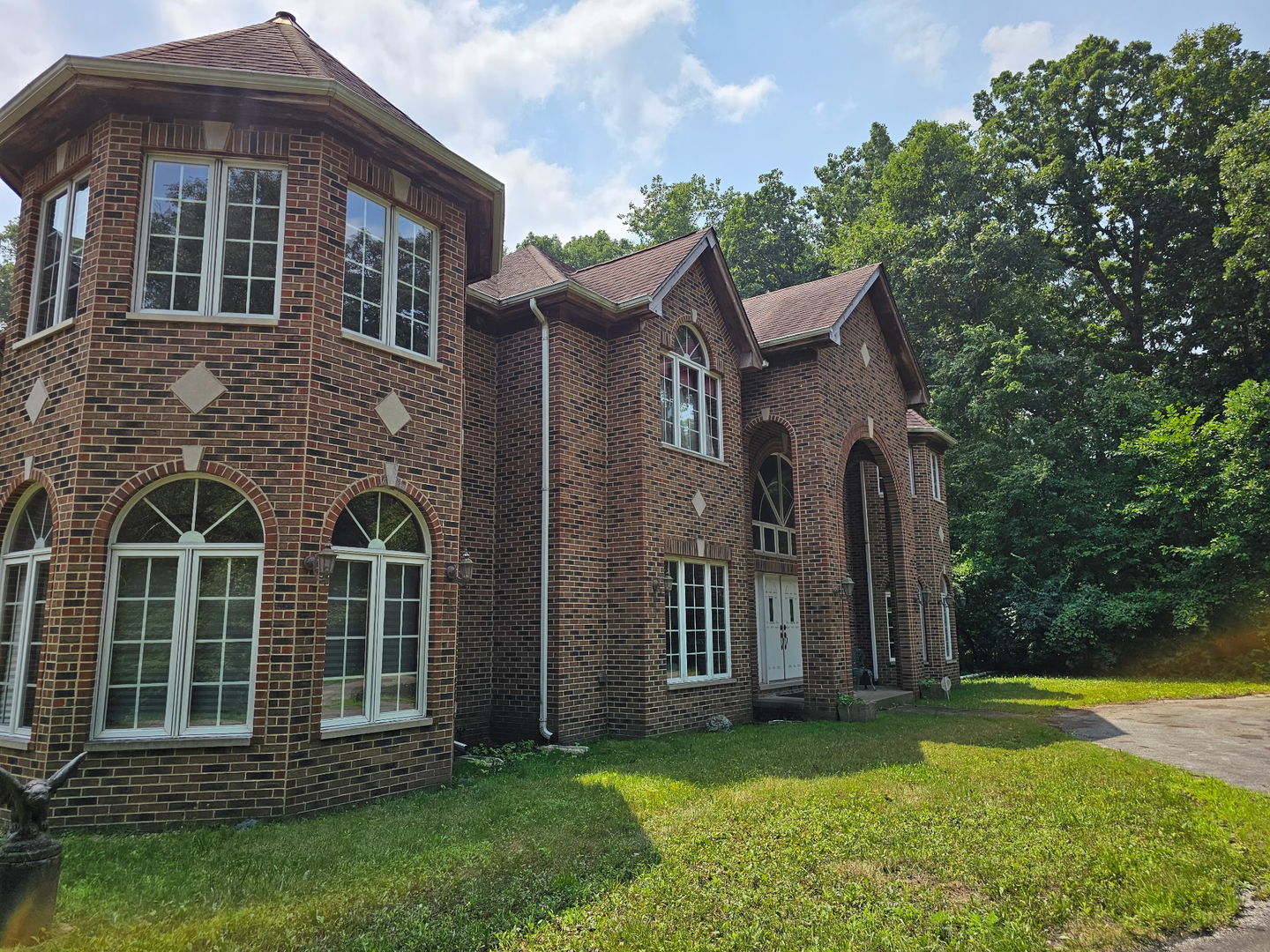 22775 Sherman Road Steger, IL 60475 - Photo 2 of 23 a view of a brick house with a yard and large trees