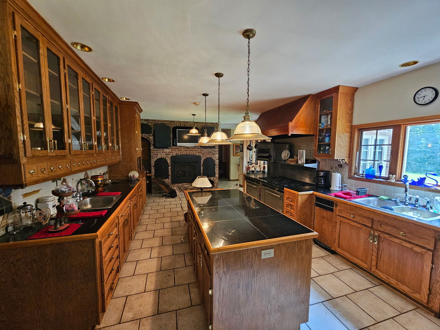 22775 Sherman Road Steger, IL 60475 - Photo 6 of 23 a kitchen that has a lot of cabinets in it