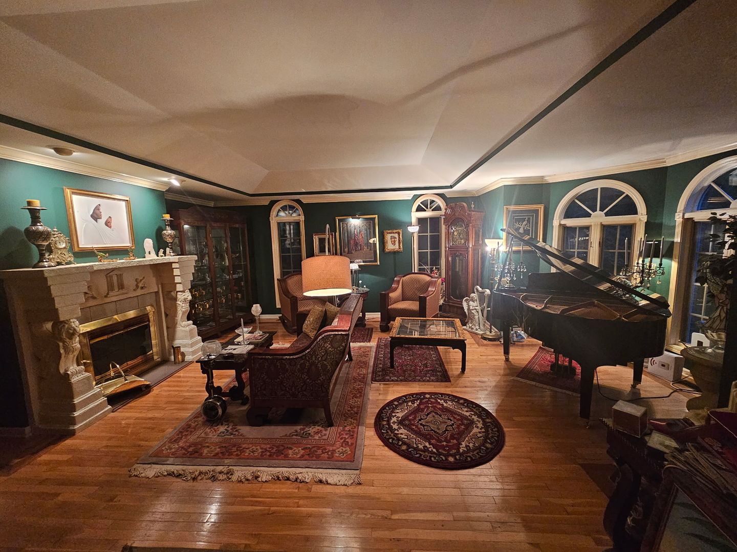 22775 Sherman Road Steger, IL 60475 - Photo 7 of 23 a living room with furniture a fireplace and a flat screen tv