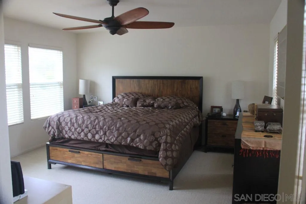 1467 Beechtree Road San Marcos, CA 92078 - Photo 4 of 8 a bedroom with a bed and window